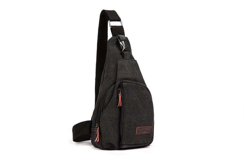 Compact shoulder bag with multiple zippered compartments and adjustable shoulder strap