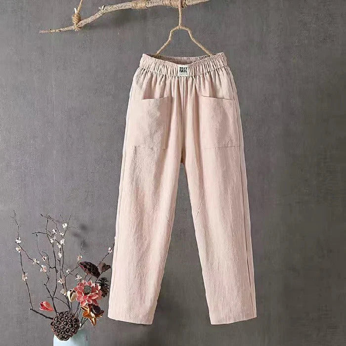 Straight-cut trousers with an elastic waistband and a simple design