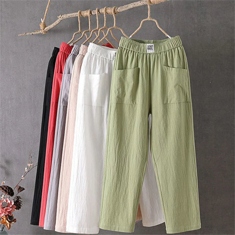 Straight-cut trousers with an elastic waistband and a simple design