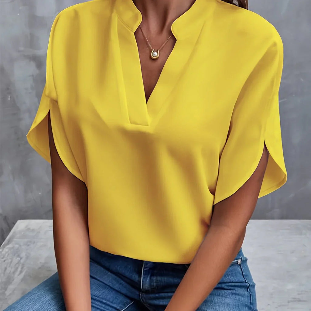 Short-sleeved top with V-neck and loose cut