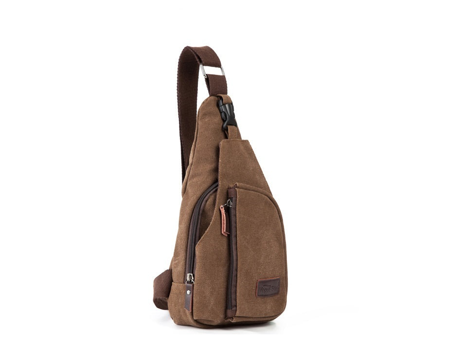 Compact shoulder bag with multiple zippered compartments and adjustable shoulder strap