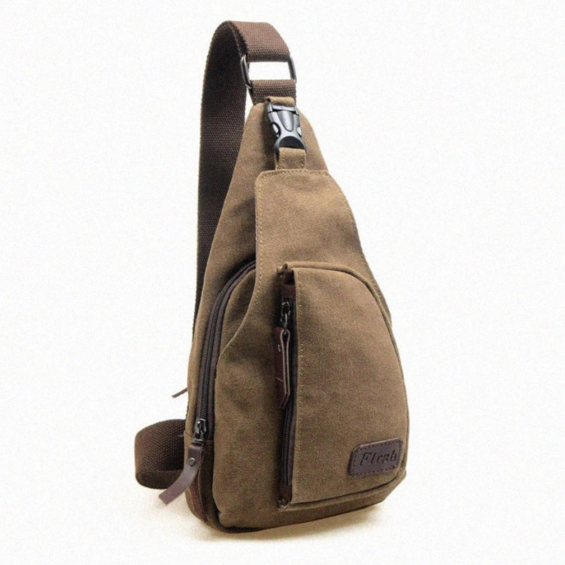 Compact shoulder bag with multiple zippered compartments and adjustable shoulder strap