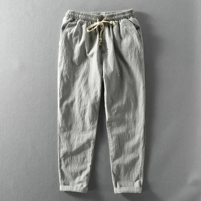 Leisure trousers with elastic waistband, drawstring and narrow leg cuffs