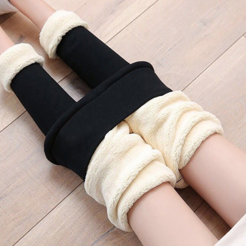 Fleece-lined leggings with wide waistband and stretch fabric