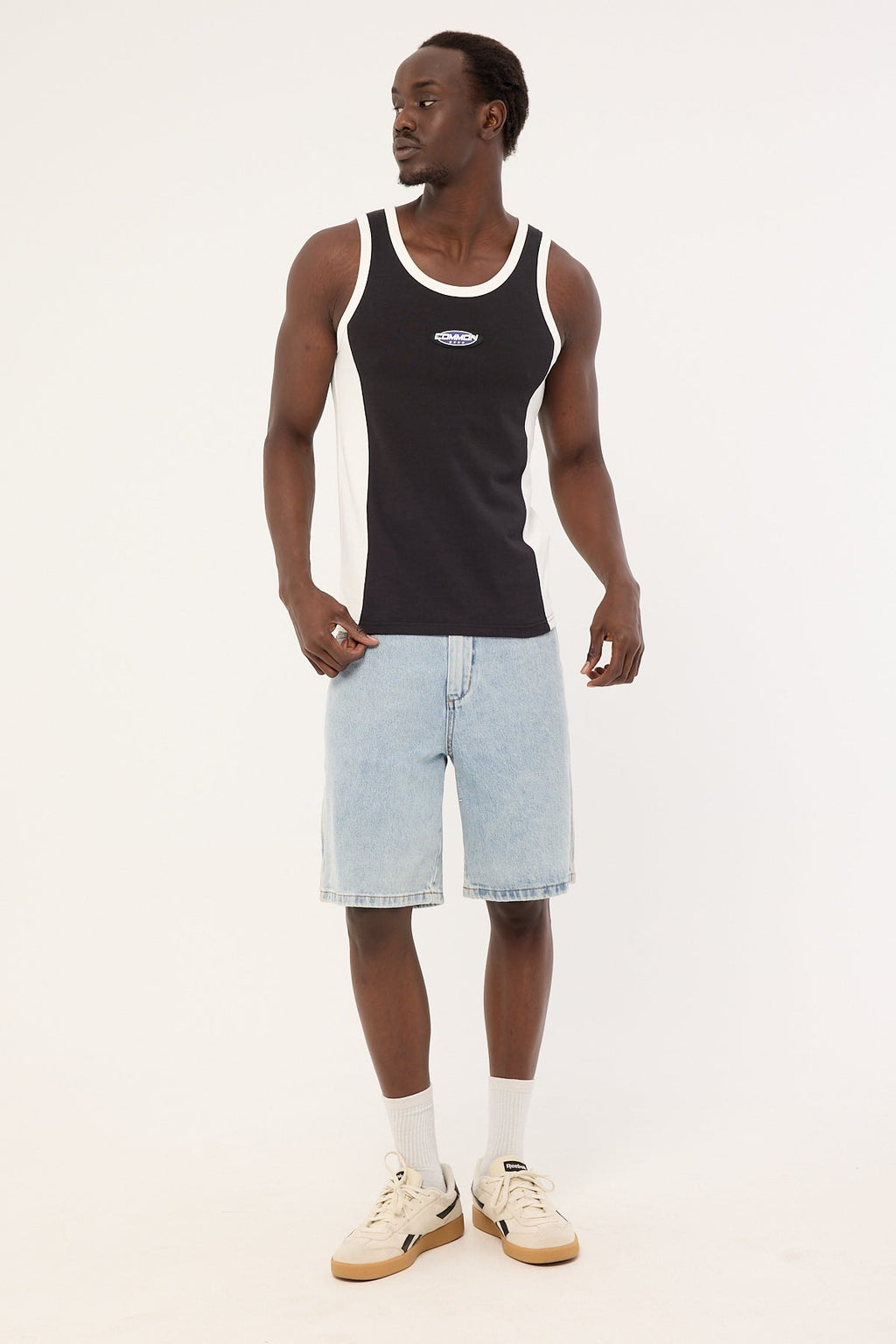 Common Need Oval Panel Singlet Washed Black