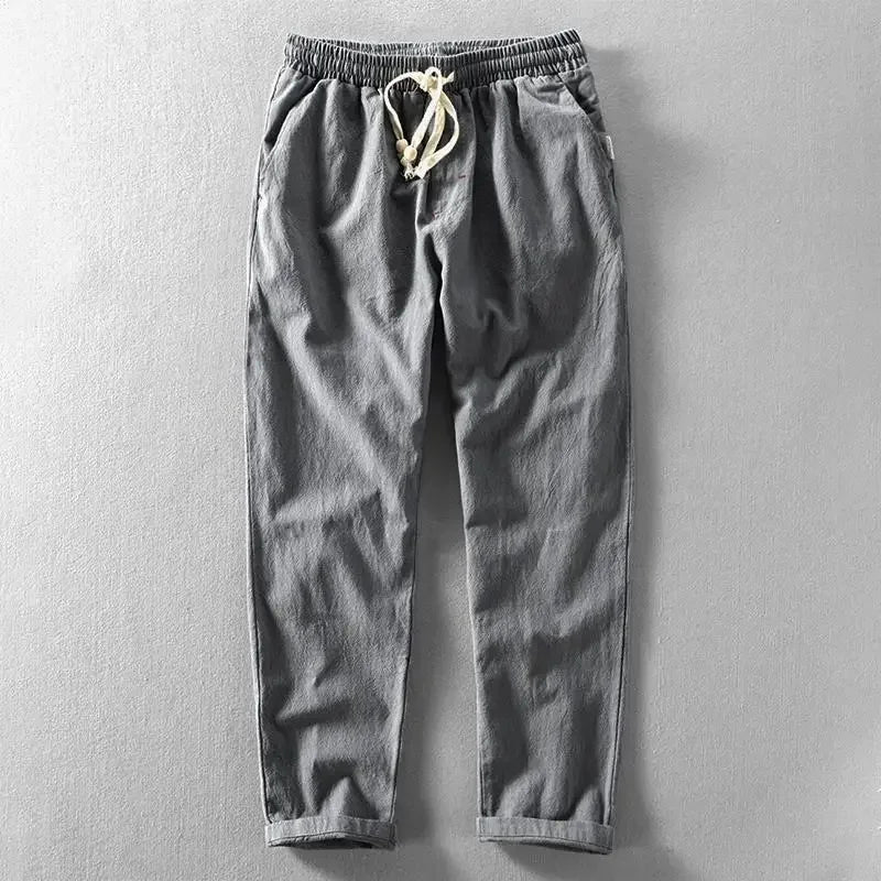 Leisure trousers with elastic waistband, drawstring and narrow leg cuffs