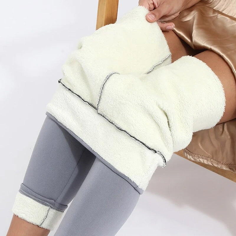 Fleece-lined leggings with wide waistband and stretch fabric