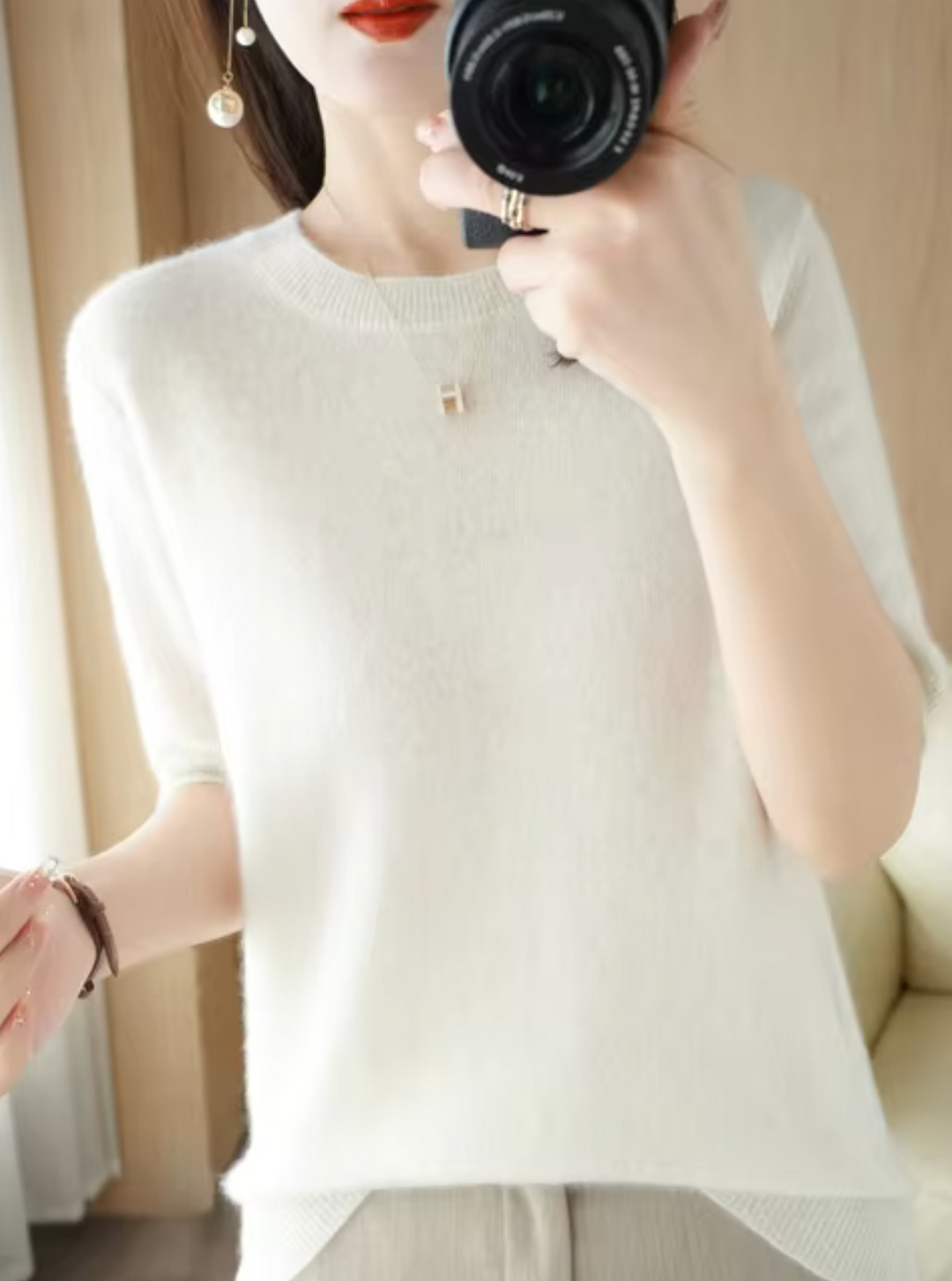 Short-sleeved knit top with round neckline
