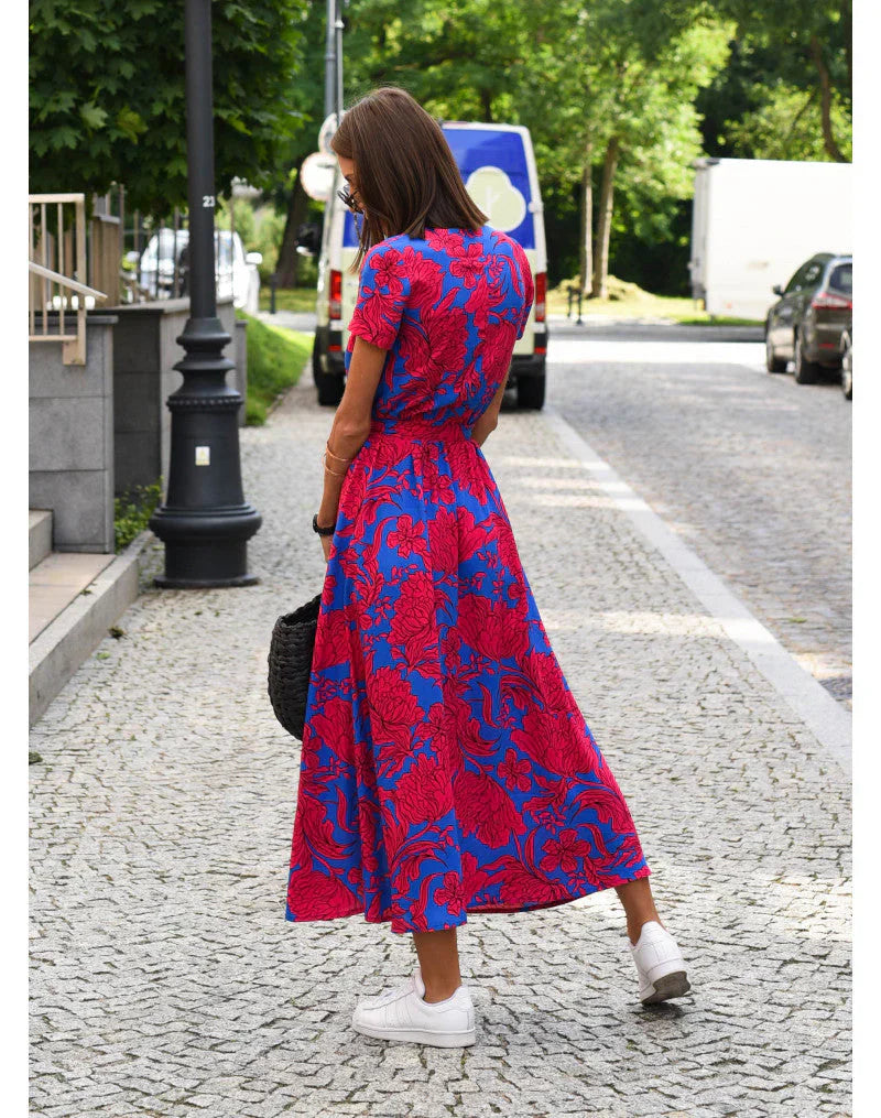 Sleeveless maxi dress with round neck and all-over pattern