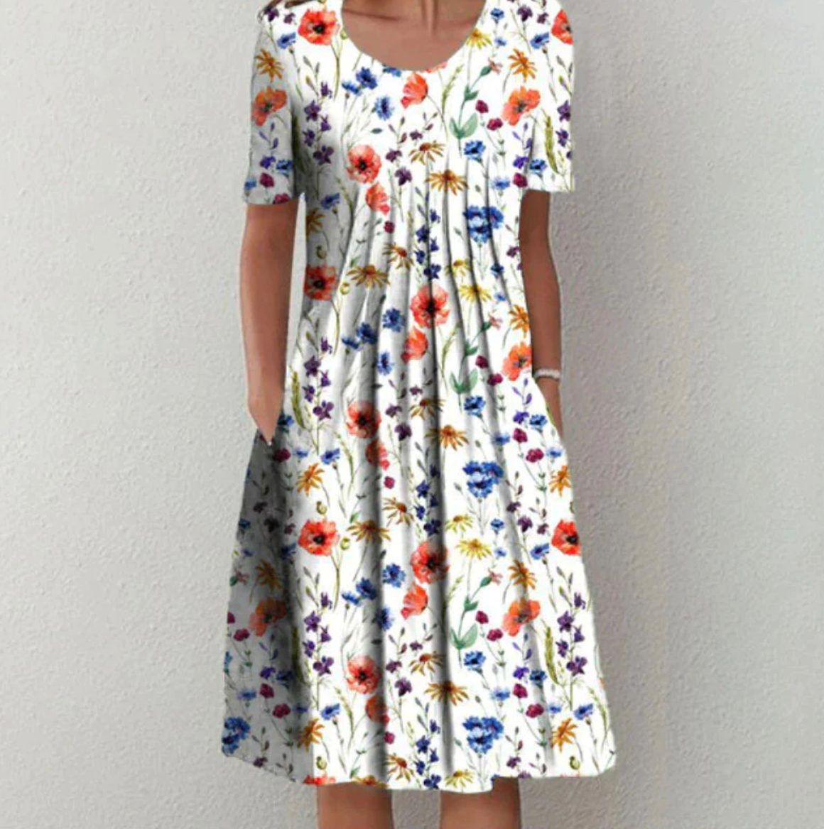 Knee-length women's dress with pattern and V-neck