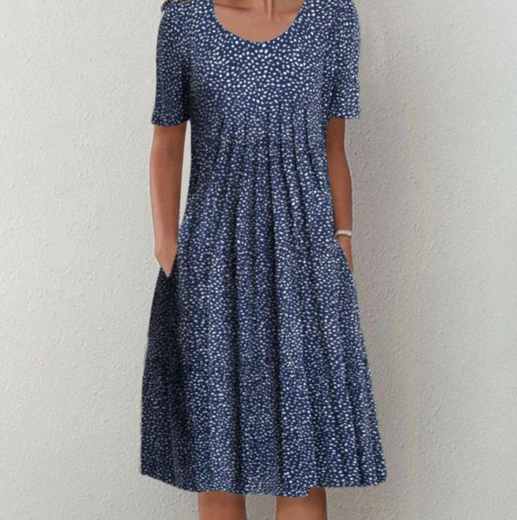 Knee-length women's dress with pattern and V-neck