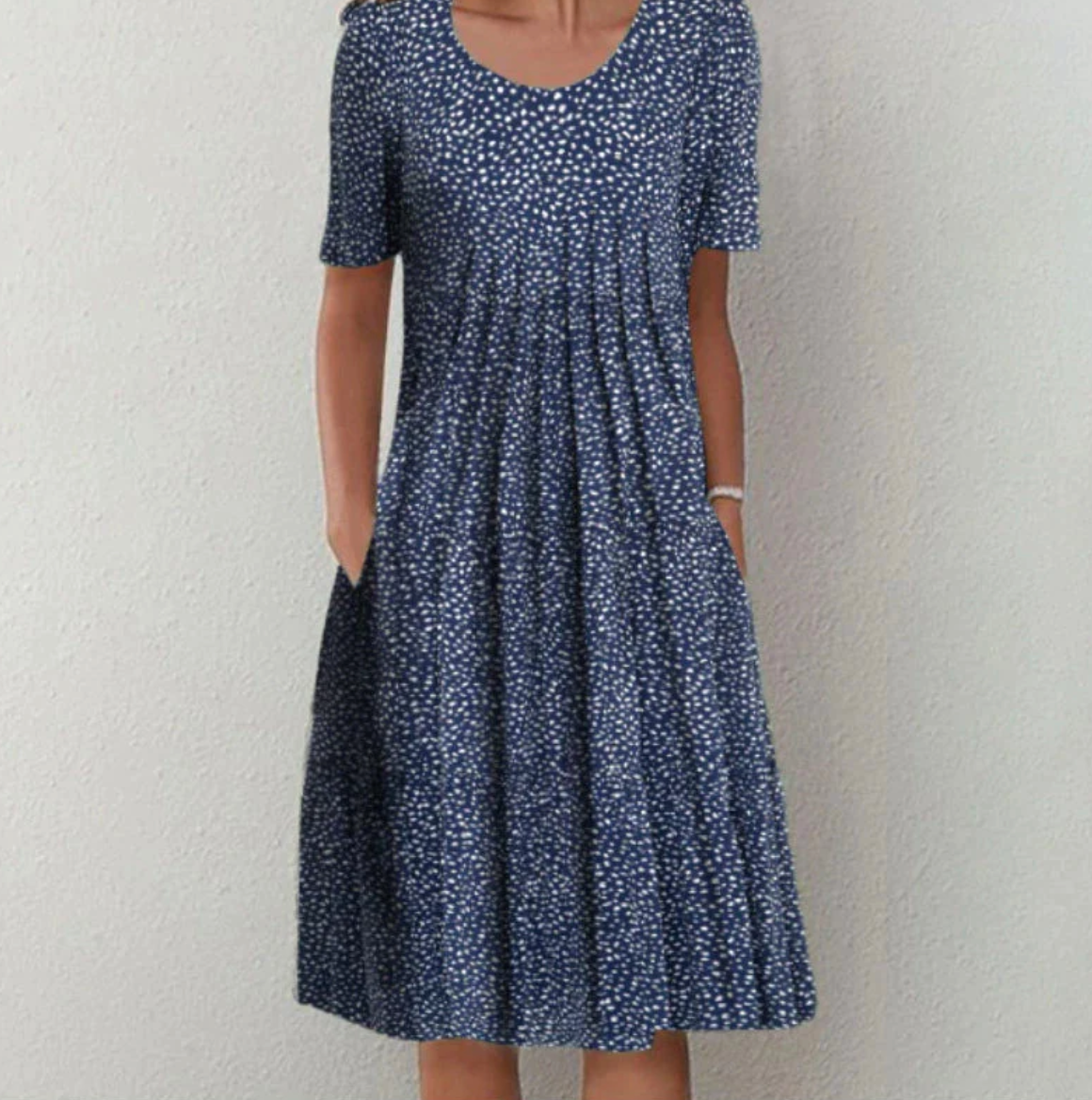 Knee-length women's dress with pattern and V-neck