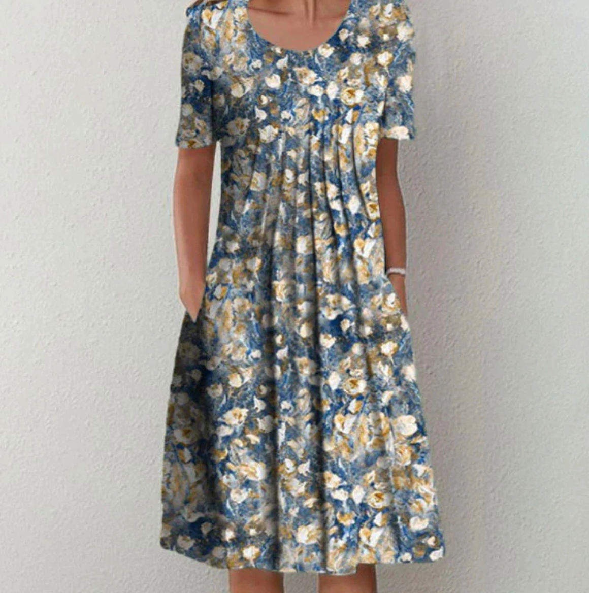 Knee-length women's dress with pattern and V-neck