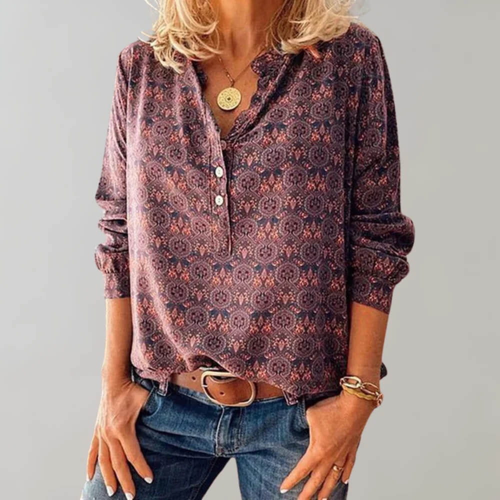 Women's blouse with geometric pattern and button placket