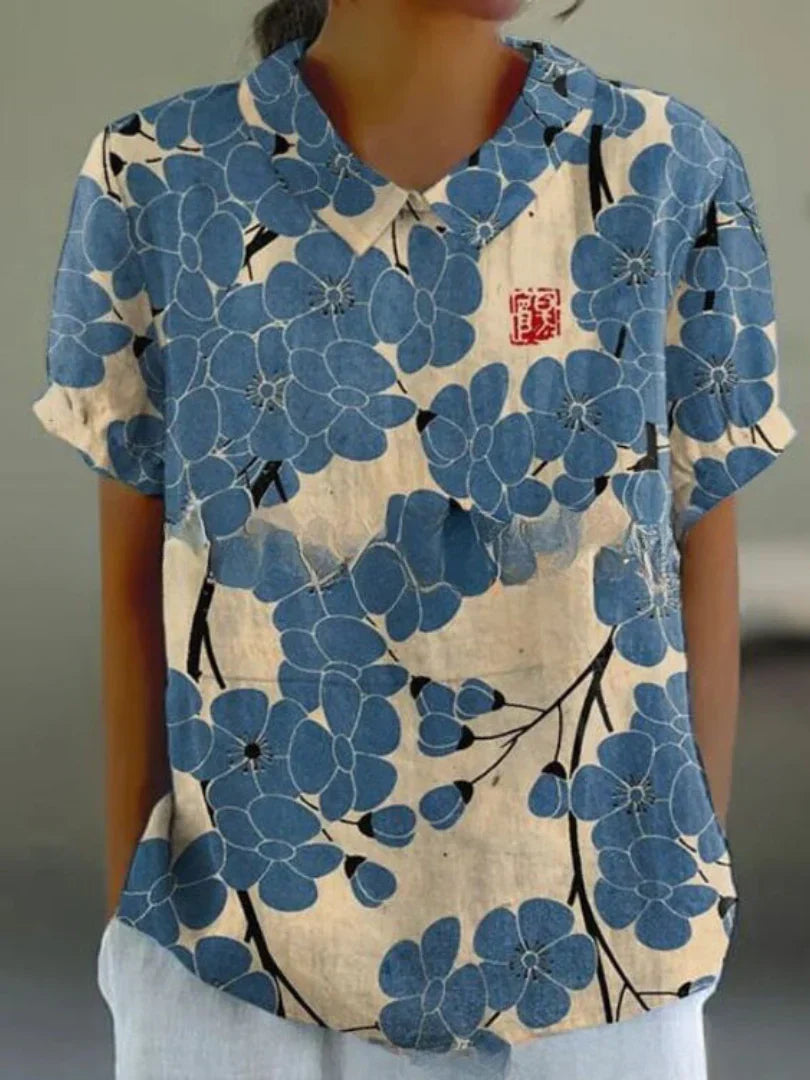 Short-sleeved blouse with button placket and floral pattern
