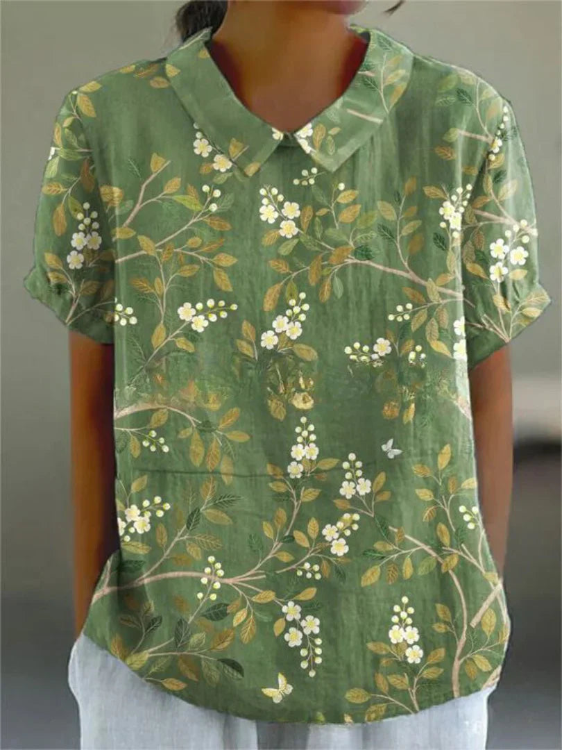 Short-sleeved blouse with button placket and floral pattern