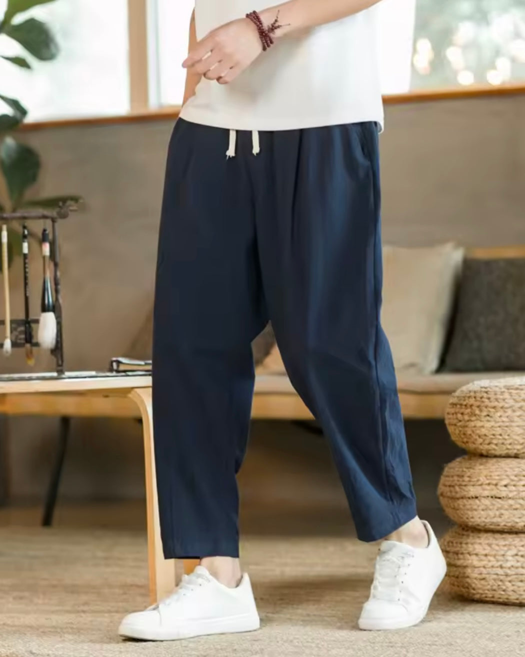 Relaxed fit drawstring trousers with tapered leg