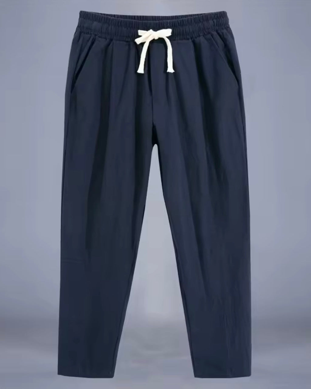 Relaxed fit drawstring trousers with tapered leg