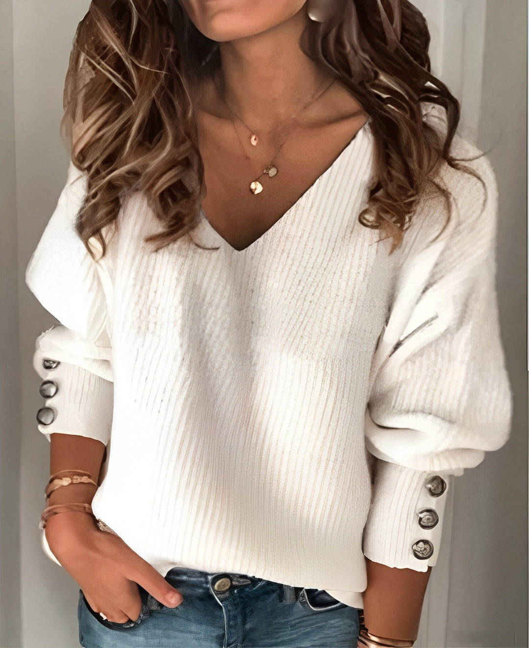 Women’s V-neck knit sweater with button-sleeve detail