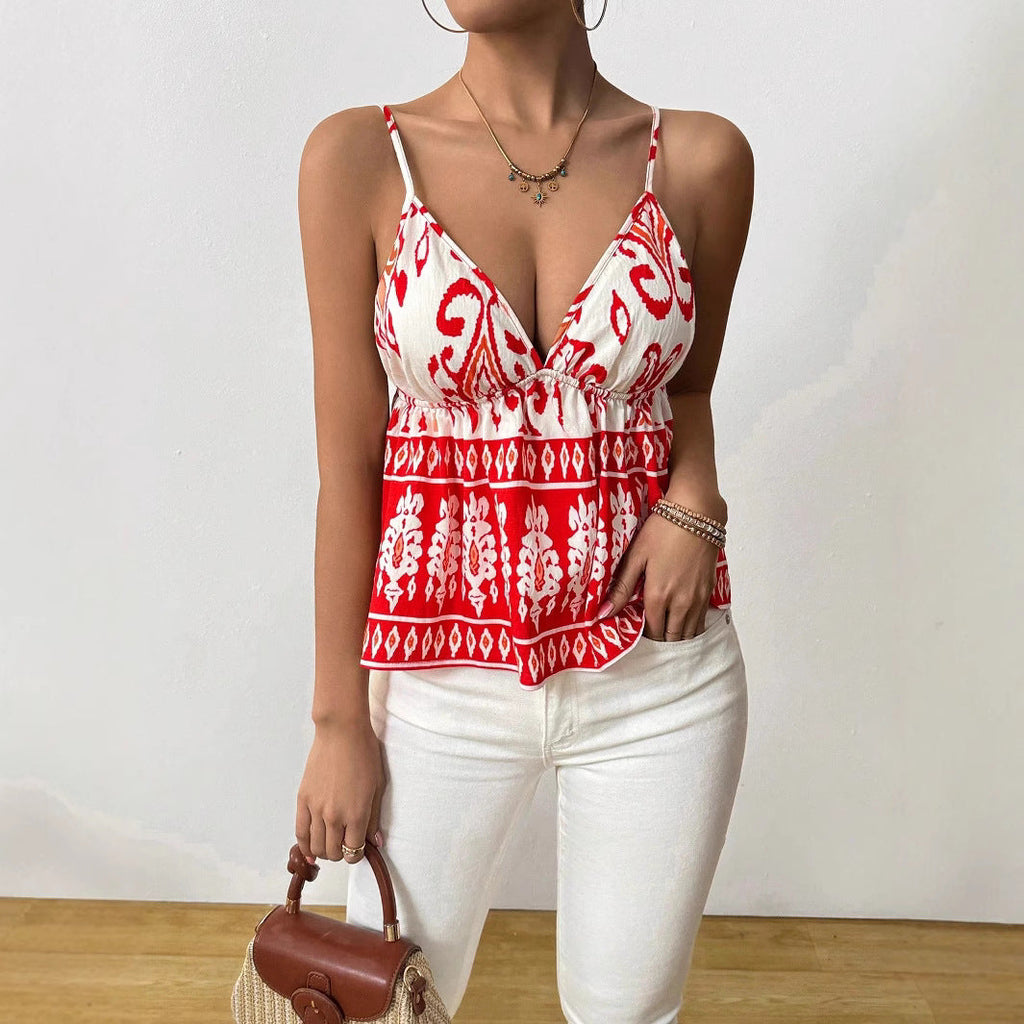 Women's top with narrow straps, V-neck and fitted cut