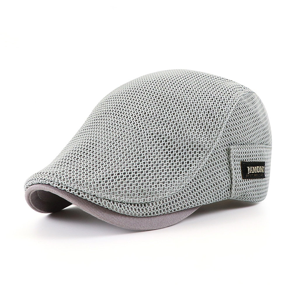 Flat-shaped men's cap made of structured material with a curved peak
