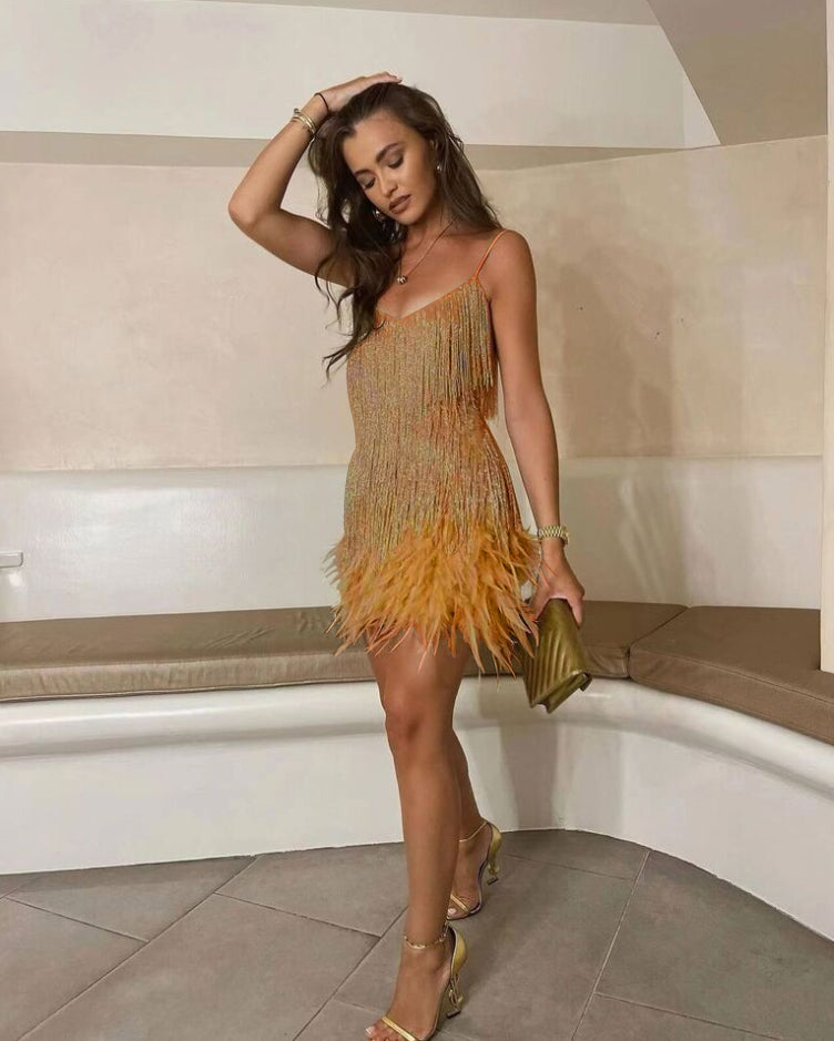 Evening dress with narrow straps and figure-hugging cut