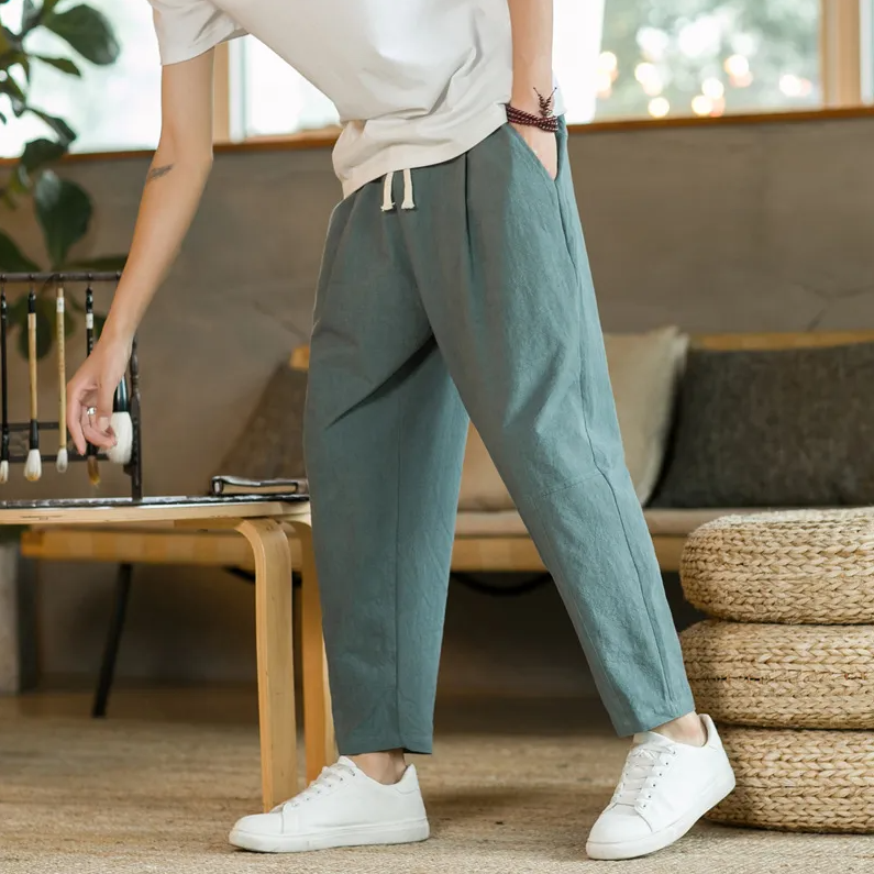 Relaxed fit drawstring trousers with tapered leg