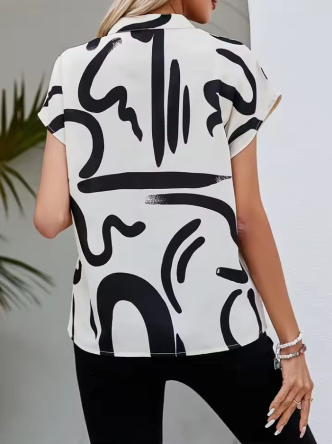 Women’s short-sleeve blouse with abstract black-and-white print