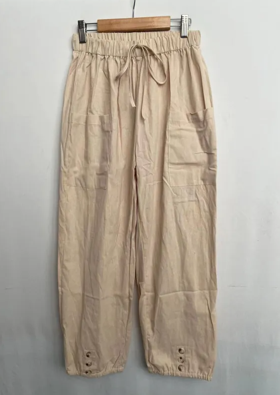 Relaxed fit drawstring trousers with side pockets