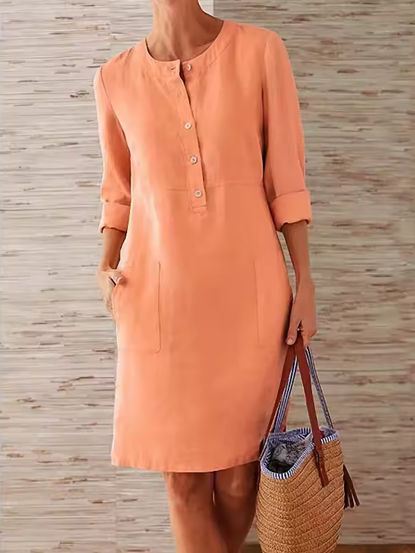 Straight-cut dress with round neckline and button placket