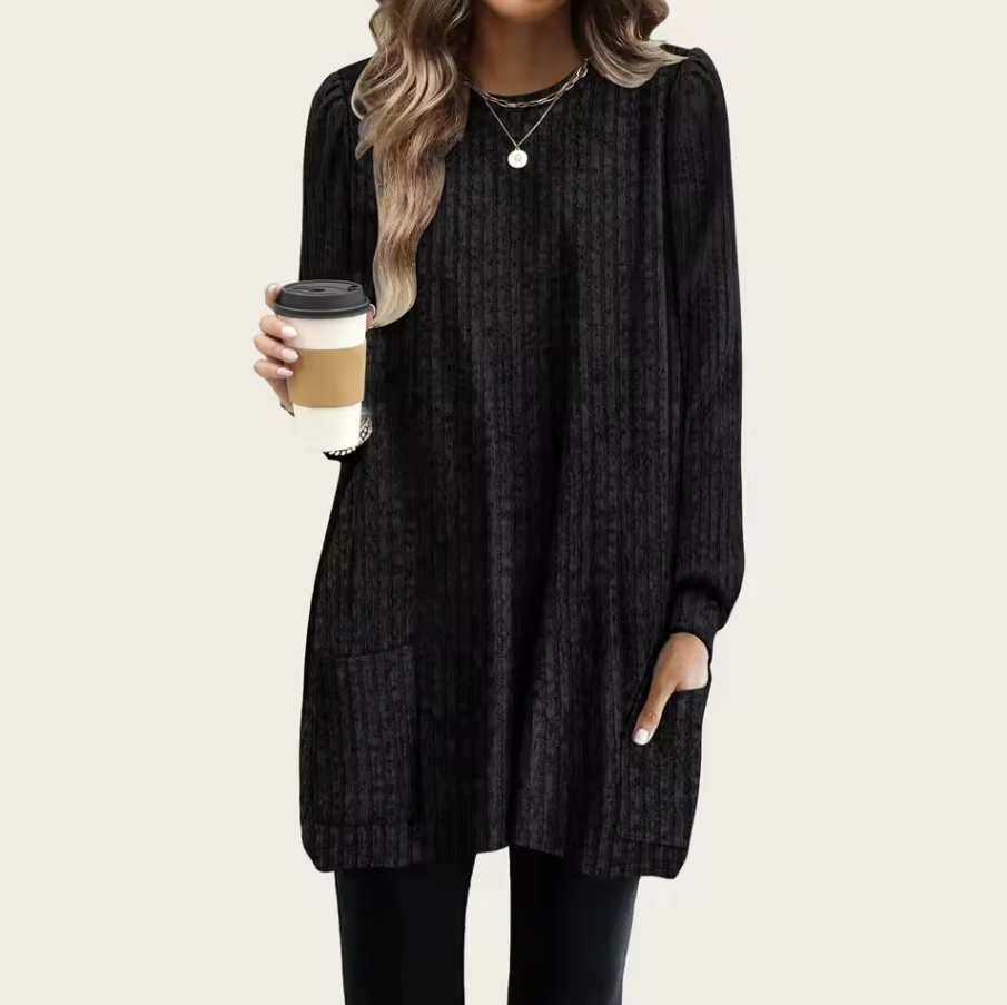 Long knitted sweater with ribbed texture and front pocket