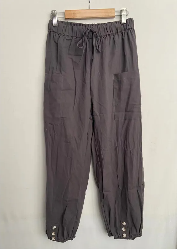 Relaxed fit drawstring trousers with side pockets