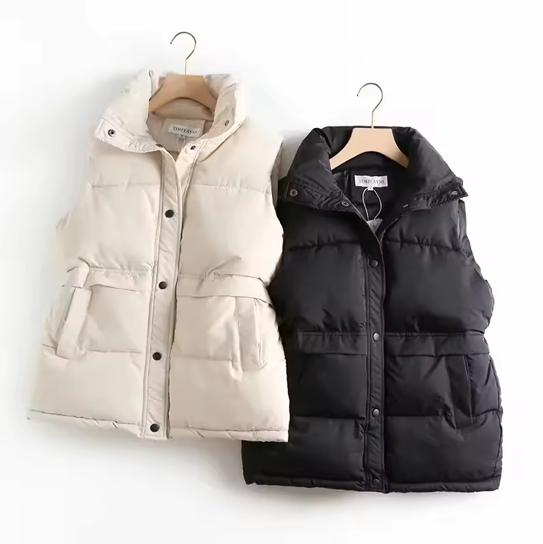 Padded quilted vest with detachable hood and button closure