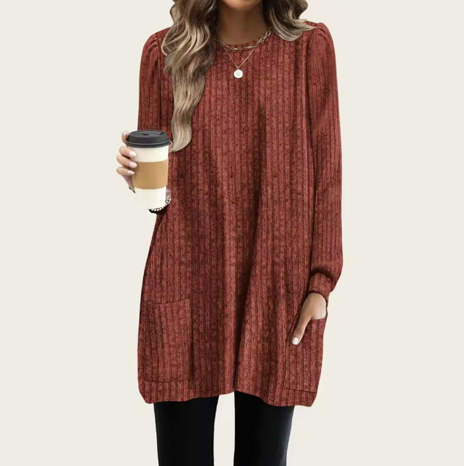 Long knitted sweater with ribbed texture and front pocket