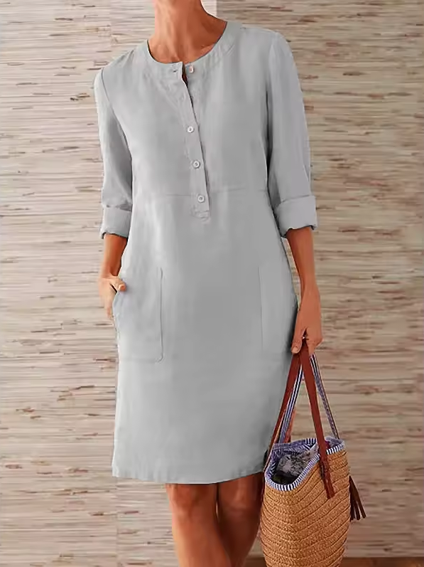 Straight-cut dress with round neckline and button placket
