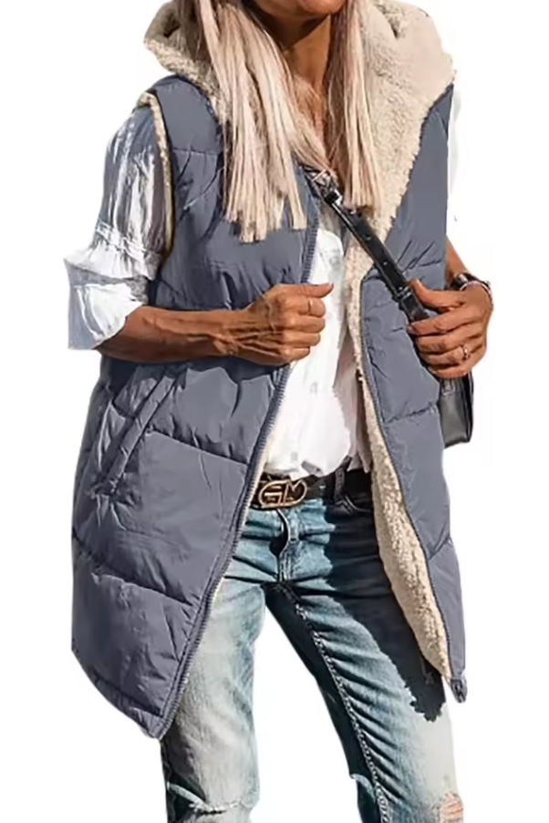 Long quilted vest with hood and button closure