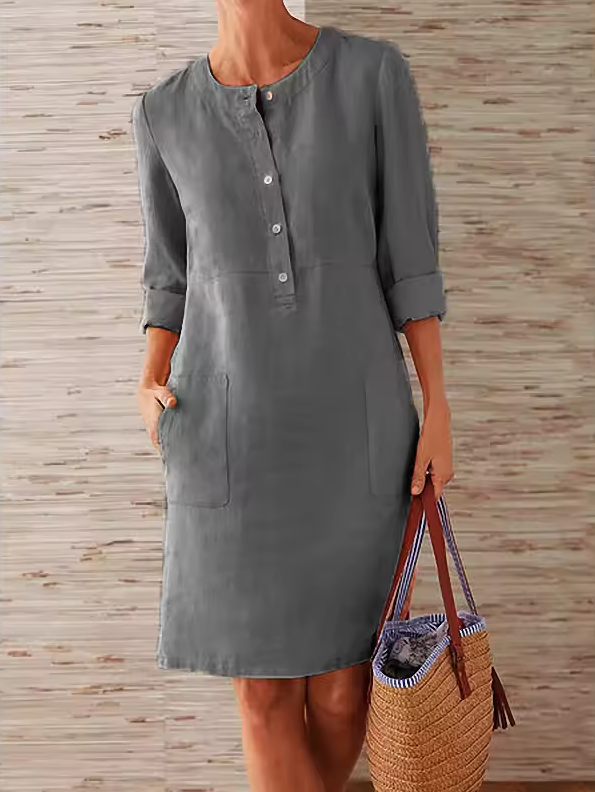 Straight-cut dress with round neckline and button placket