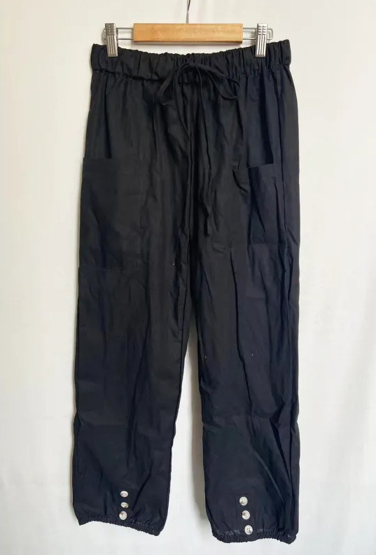 Relaxed fit drawstring trousers with side pockets
