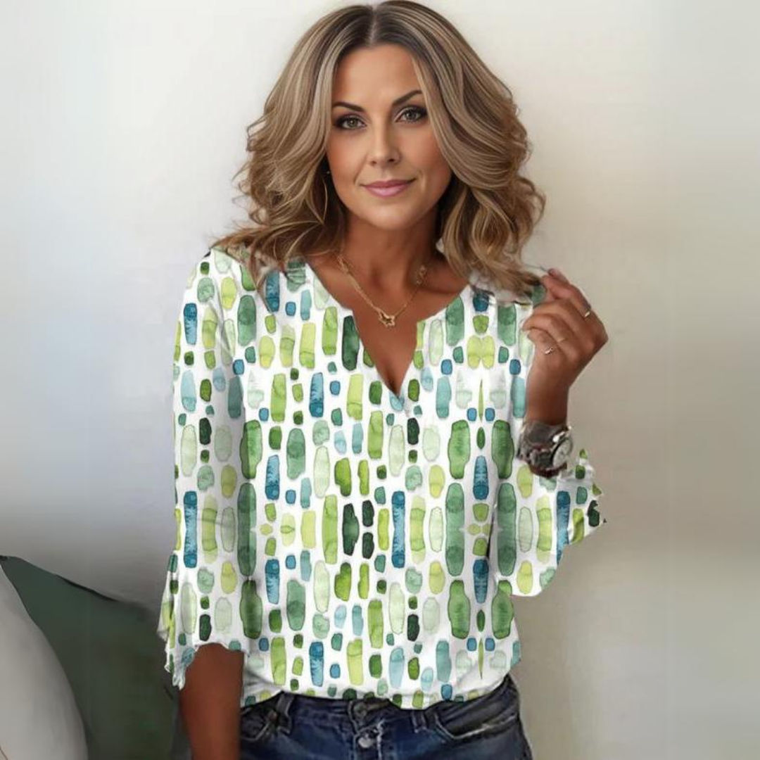 Women's blouse with graphic pattern and V-neck