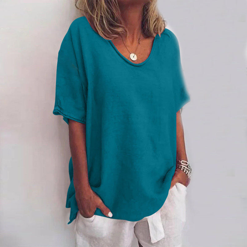 Loose-fitting women's blouse with round neck and tie details on the sleeves