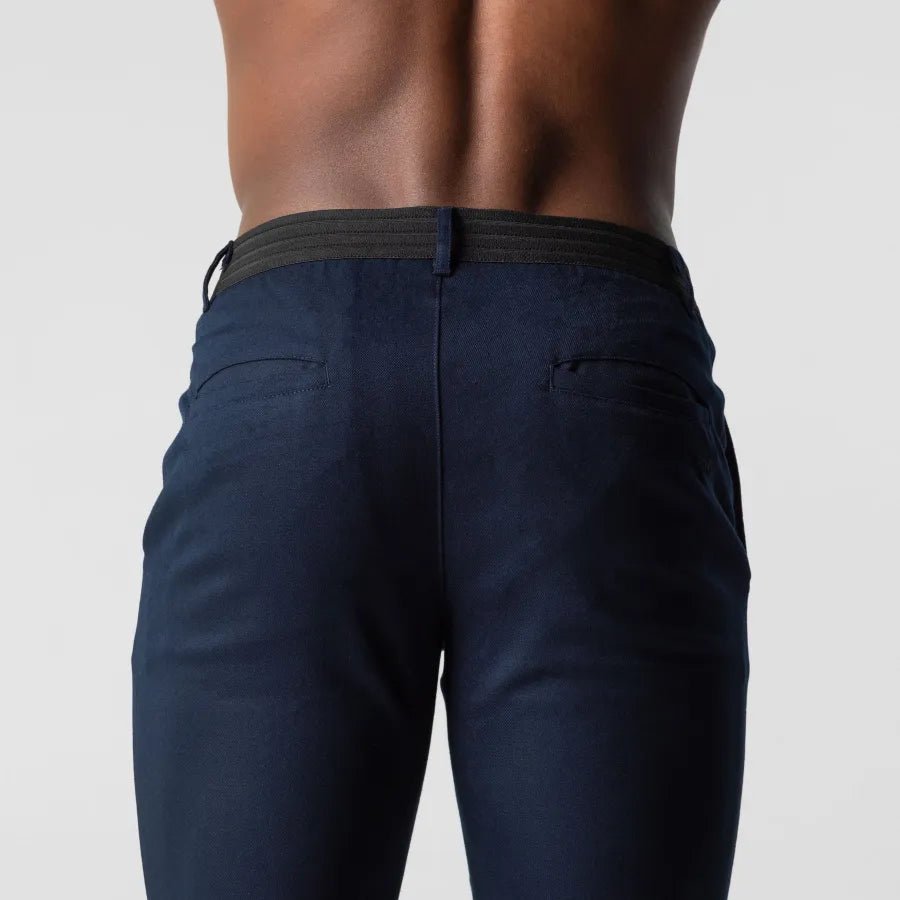 Men's chino trousers with a tapered fit and piped back pockets