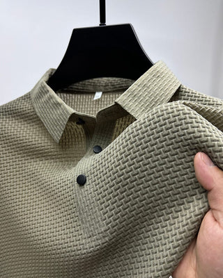 Men's polo shirt with a textured surface and a classic collar