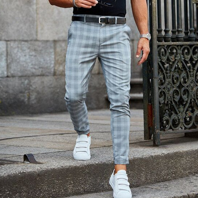 Checked men's trousers with a tapered cut