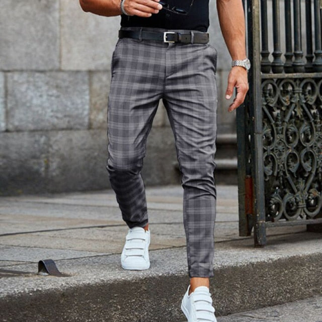 Checked men's trousers with a tapered cut