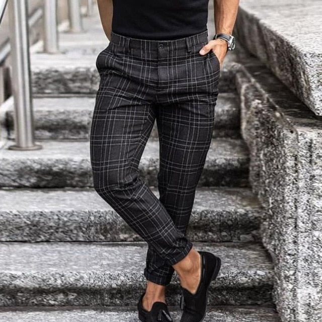 Checked men's trousers with a tapered cut