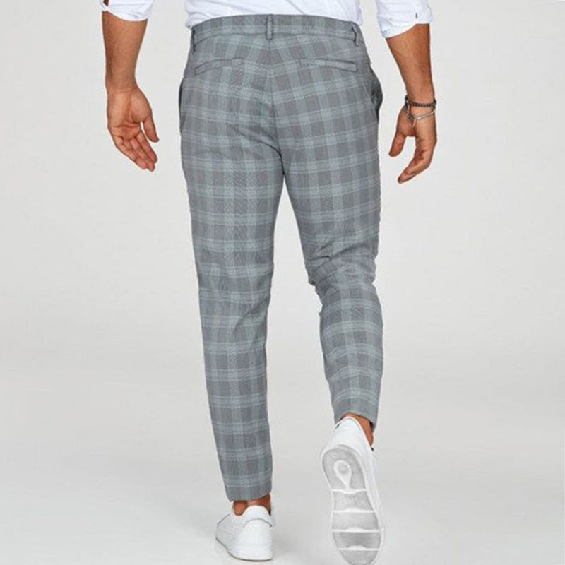 Checked men's trousers with a tapered cut