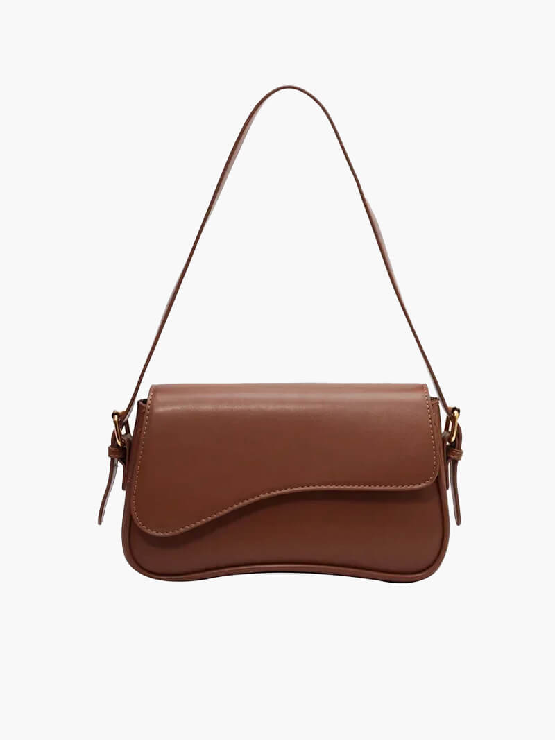 Compact shoulder bag with curved front detail and snap closure