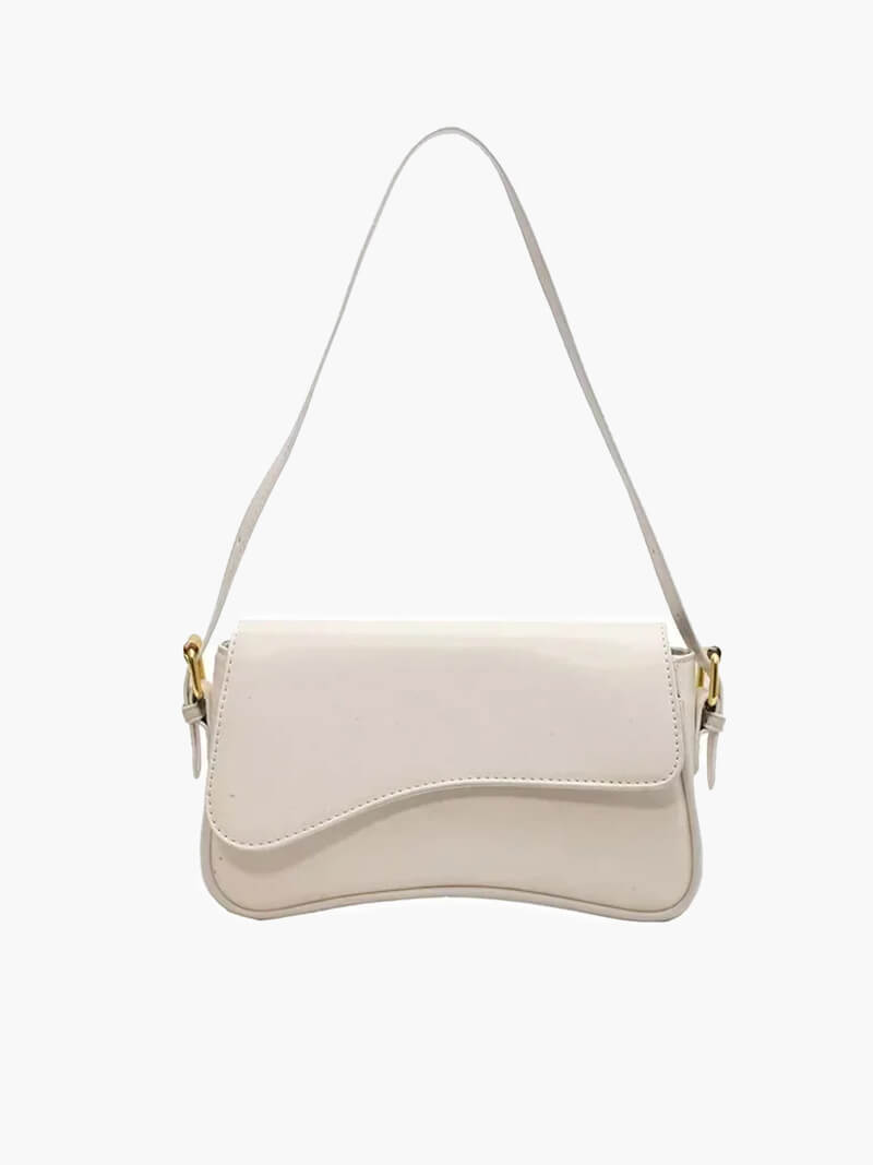 Compact shoulder bag with curved front detail and snap closure