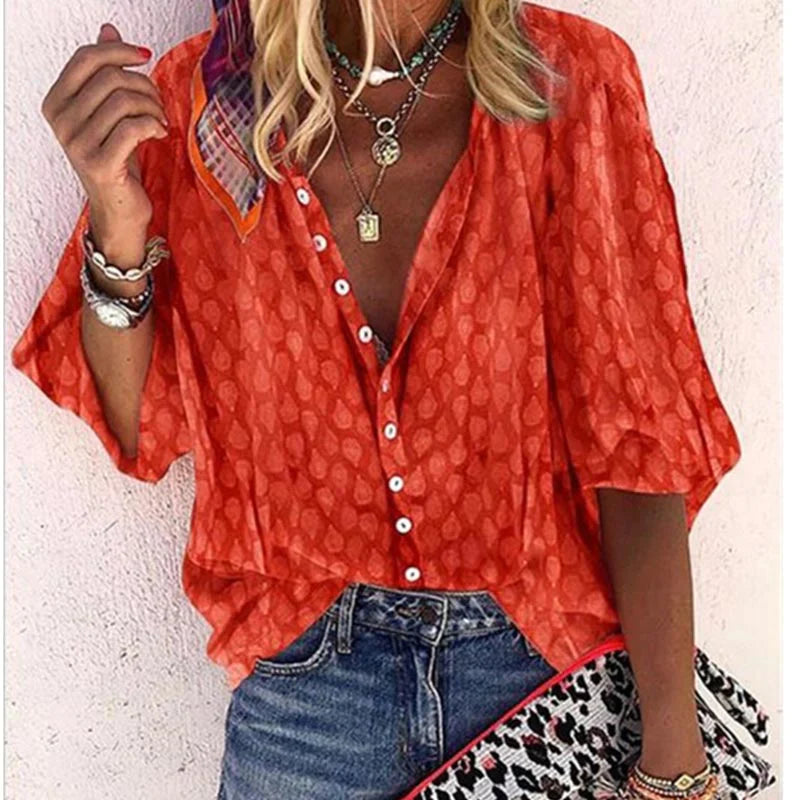Women's blouse with pattern, button placket and V-neck