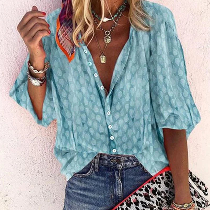 Women's blouse with pattern, button placket and V-neck